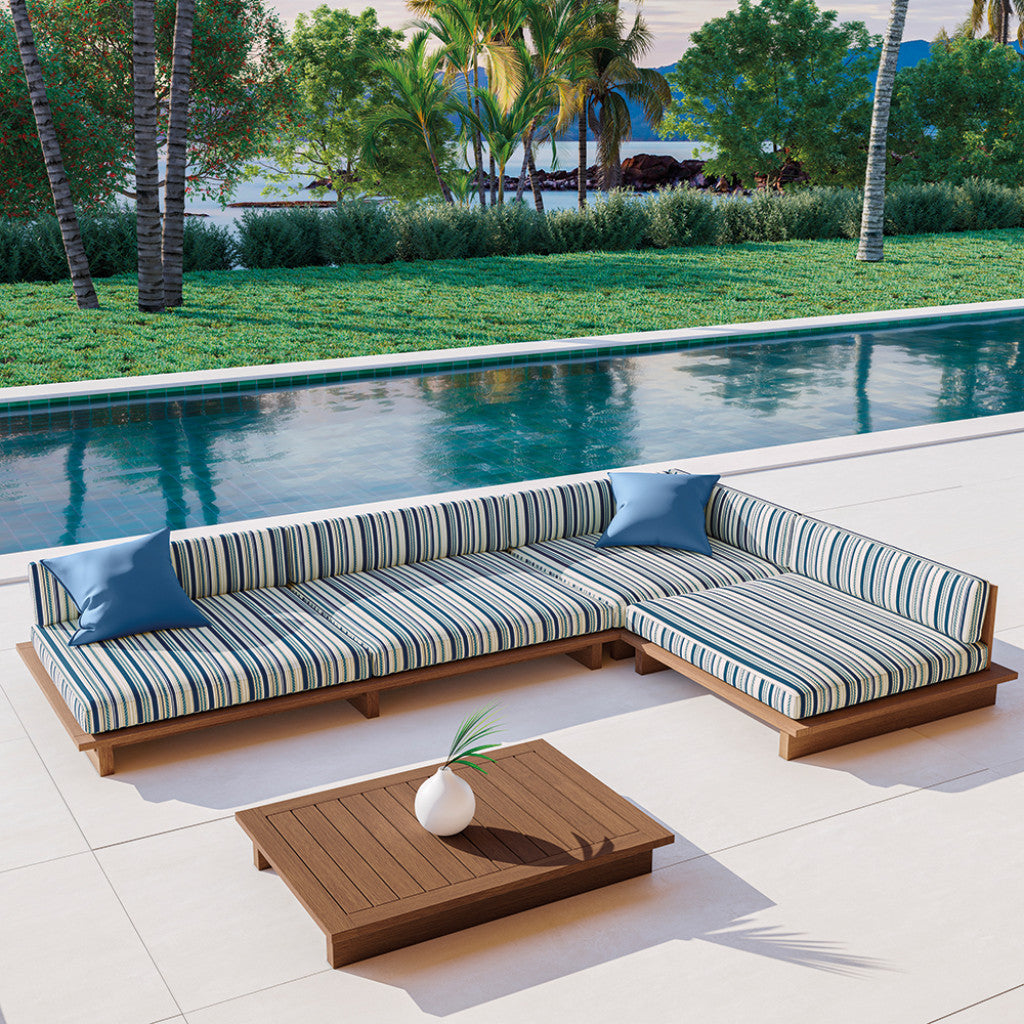 Outdoor custom made patio set with Atlantic striped fabric cushions by a poolside